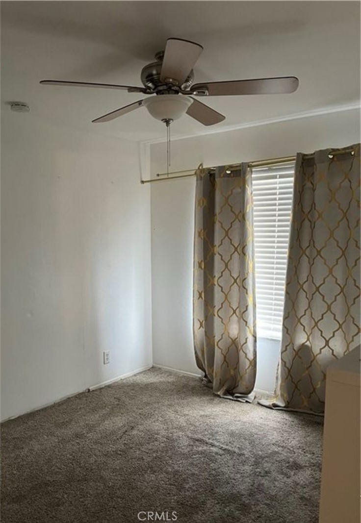 6848 Holbrook Way Riverside, CA 92504 - Photo 9 of 13 a view of a garage