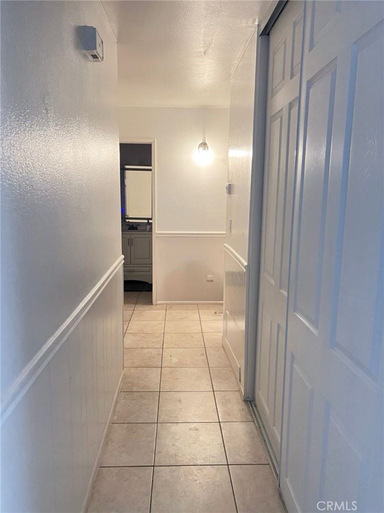 6848 Holbrook Way Riverside, CA 92504 - Photo 10 of 13 a bathroom with a shower