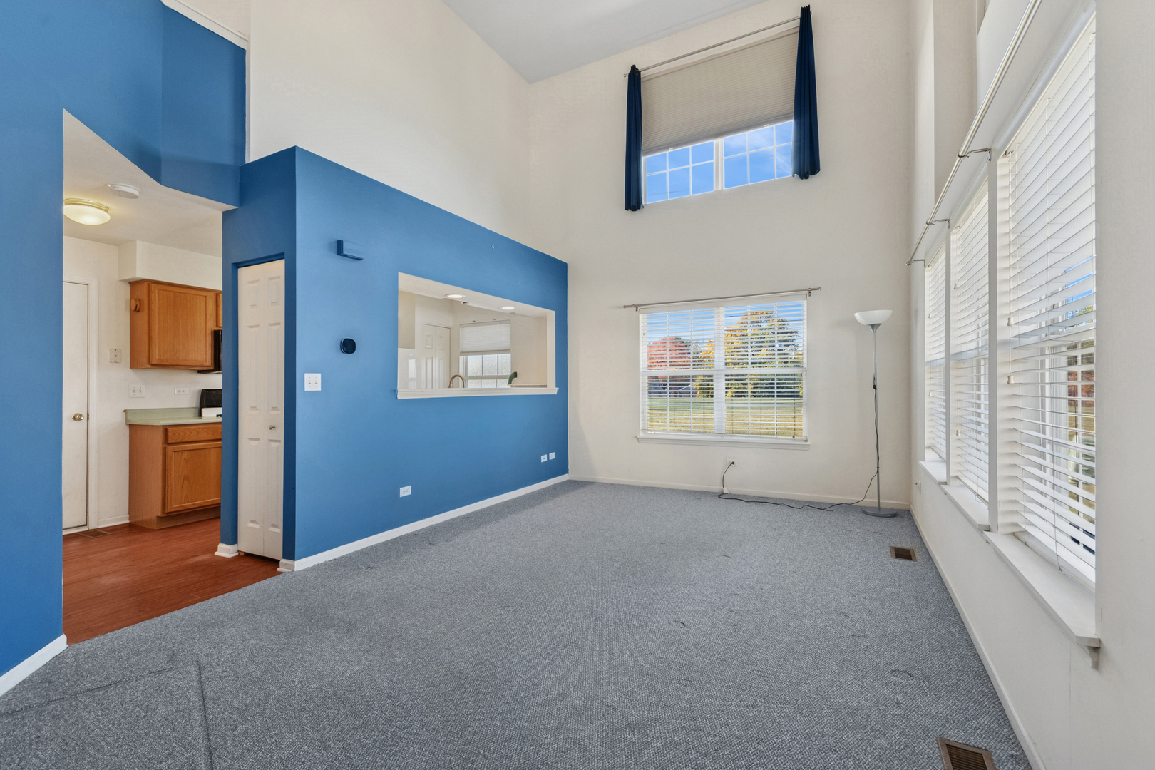 1919 Carousel Court, Unit 1919 Joliet, IL 60435 - Photo 4 of 20 a view of an empty room with a window