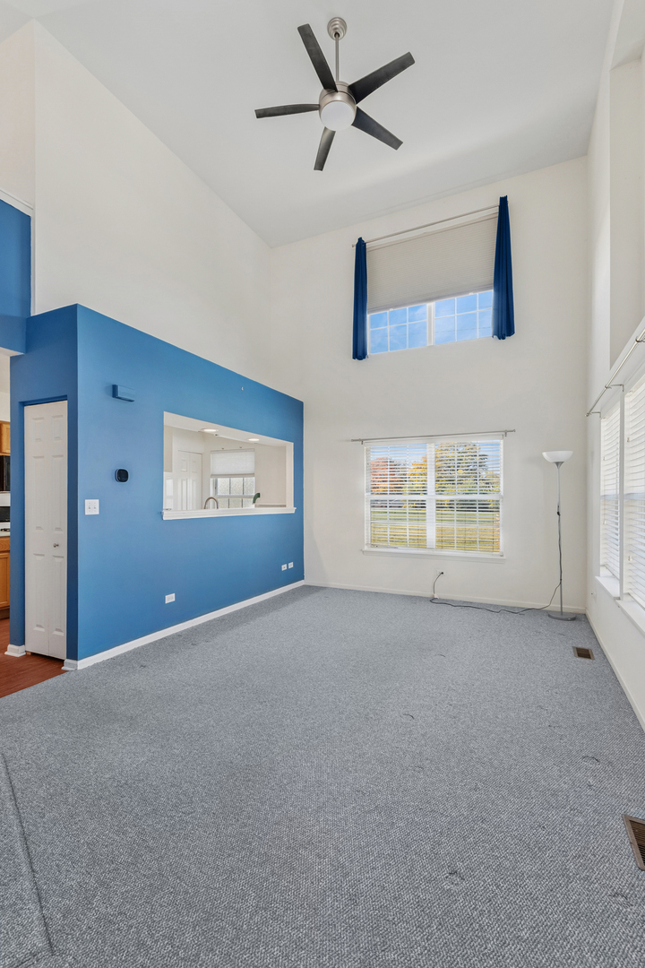 1919 Carousel Court, Unit 1919 Joliet, IL 60435 - Photo 6 of 20 a view of an empty room with a window