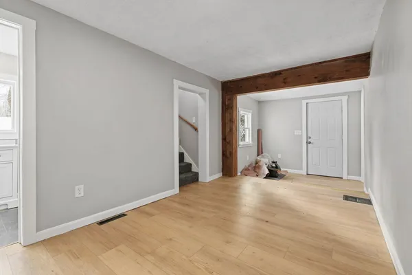 a view of a livingroom with a staircase
