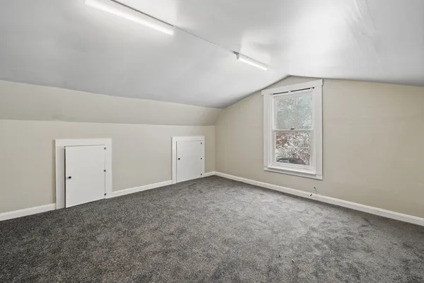 an empty room with a natural light