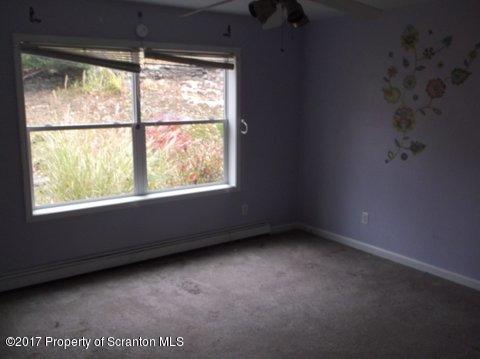 385 Rattlesnake Hill Road Meshoppen, PA 18630 - Photo 12 of 24 an empty room with a window