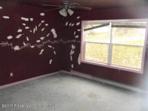 385 Rattlesnake Hill Road Meshoppen, PA 18630 - Photo 13 of 24 a view of an empty room with a window