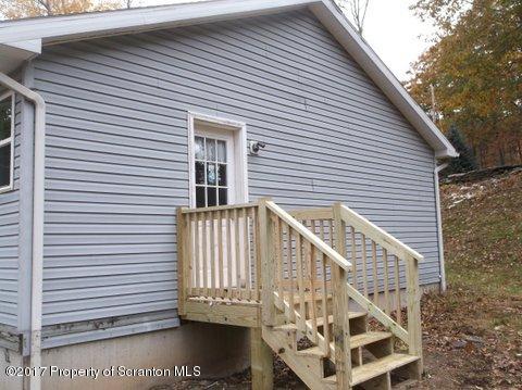 385 Rattlesnake Hill Road Meshoppen, PA 18630 - Photo 6 of 24 a view of wooden house with a small space