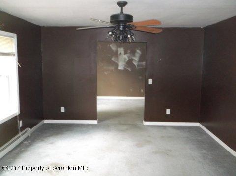 385 Rattlesnake Hill Road Meshoppen, PA 18630 - Photo 7 of 24 a view of livingroom with workspace