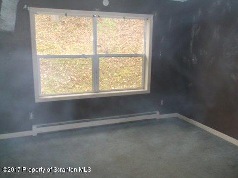 385 Rattlesnake Hill Road Meshoppen, PA 18630 - Photo 8 of 24 a view of room with window