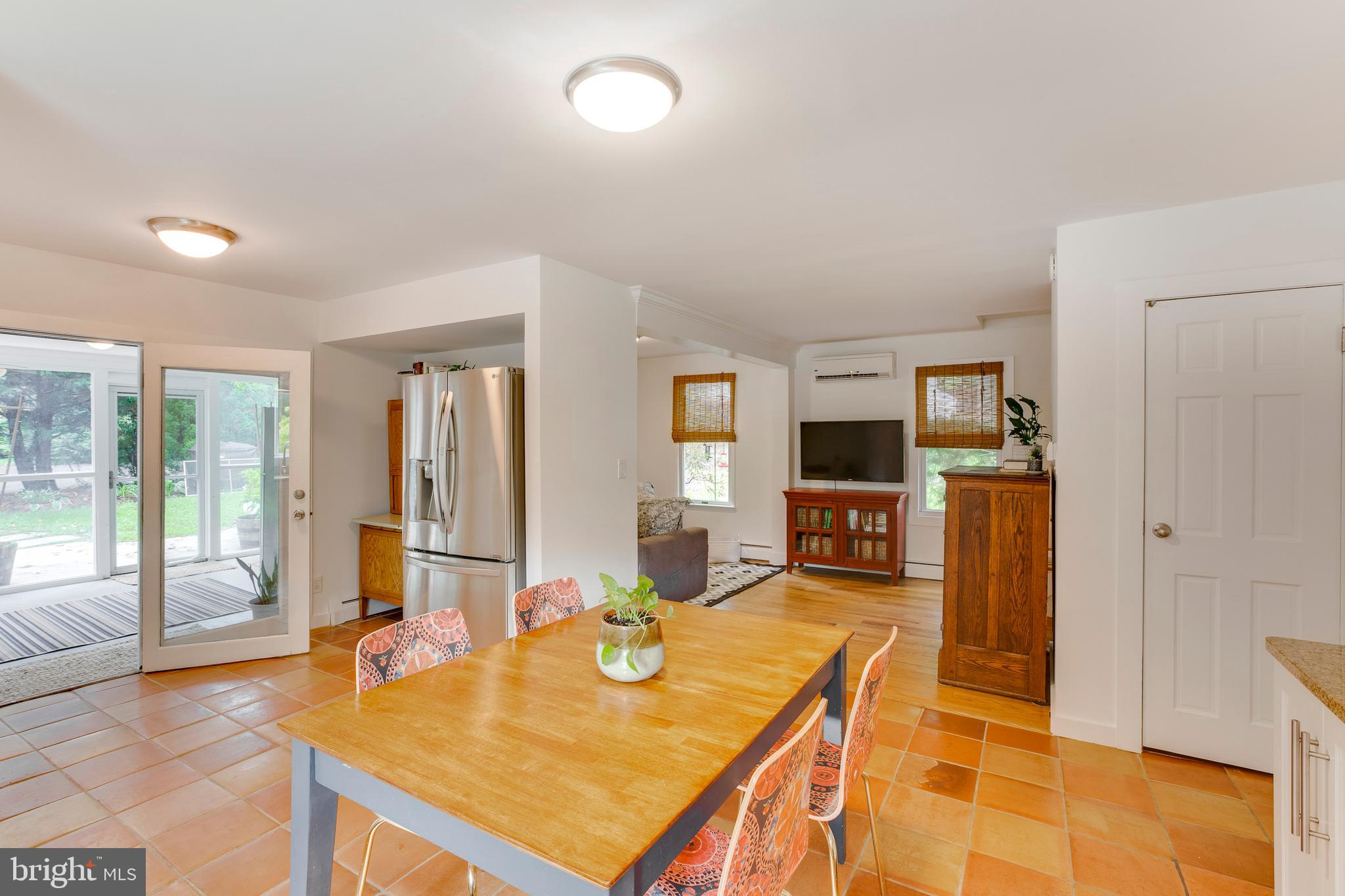 948 Diggs Road Crownsville, MD 21032 - Photo 13 of 49 kitchen flows to sunroom/porch