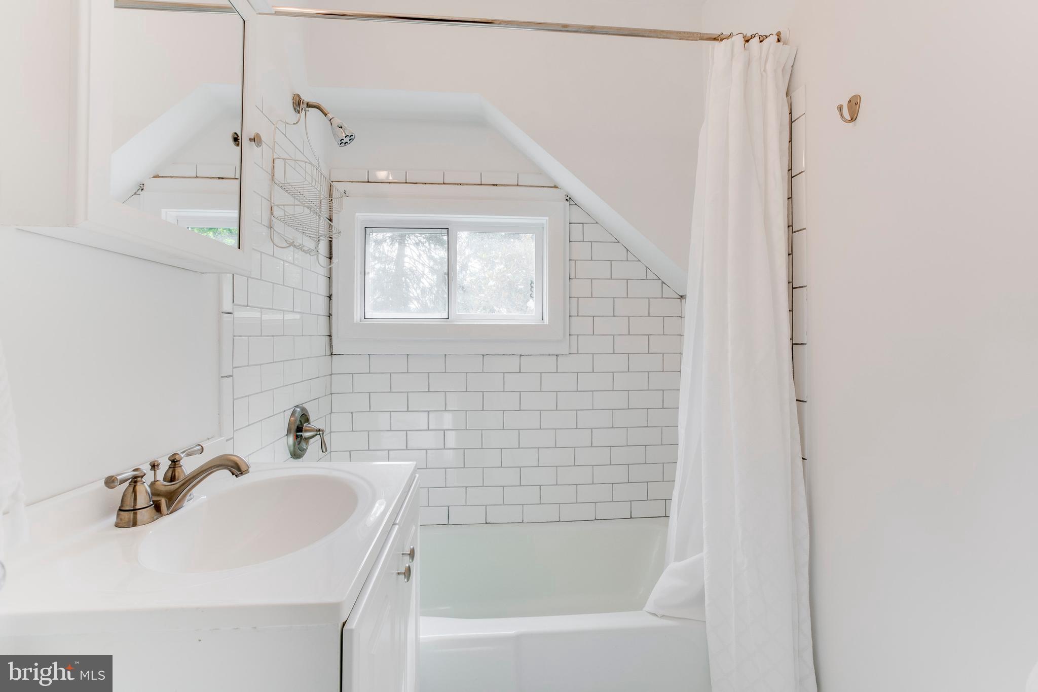 948 Diggs Road Crownsville, MD 21032 - Photo 25 of 49 updated full bath with beautiful white tiles