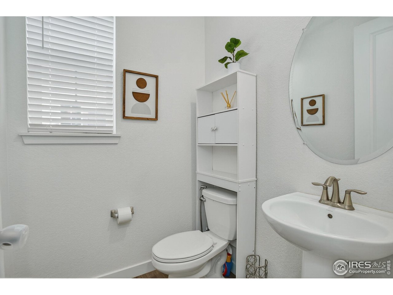 1920 Miranda Road Erie, CO 80516 - Photo 9 of 38 Half bathroom on main level