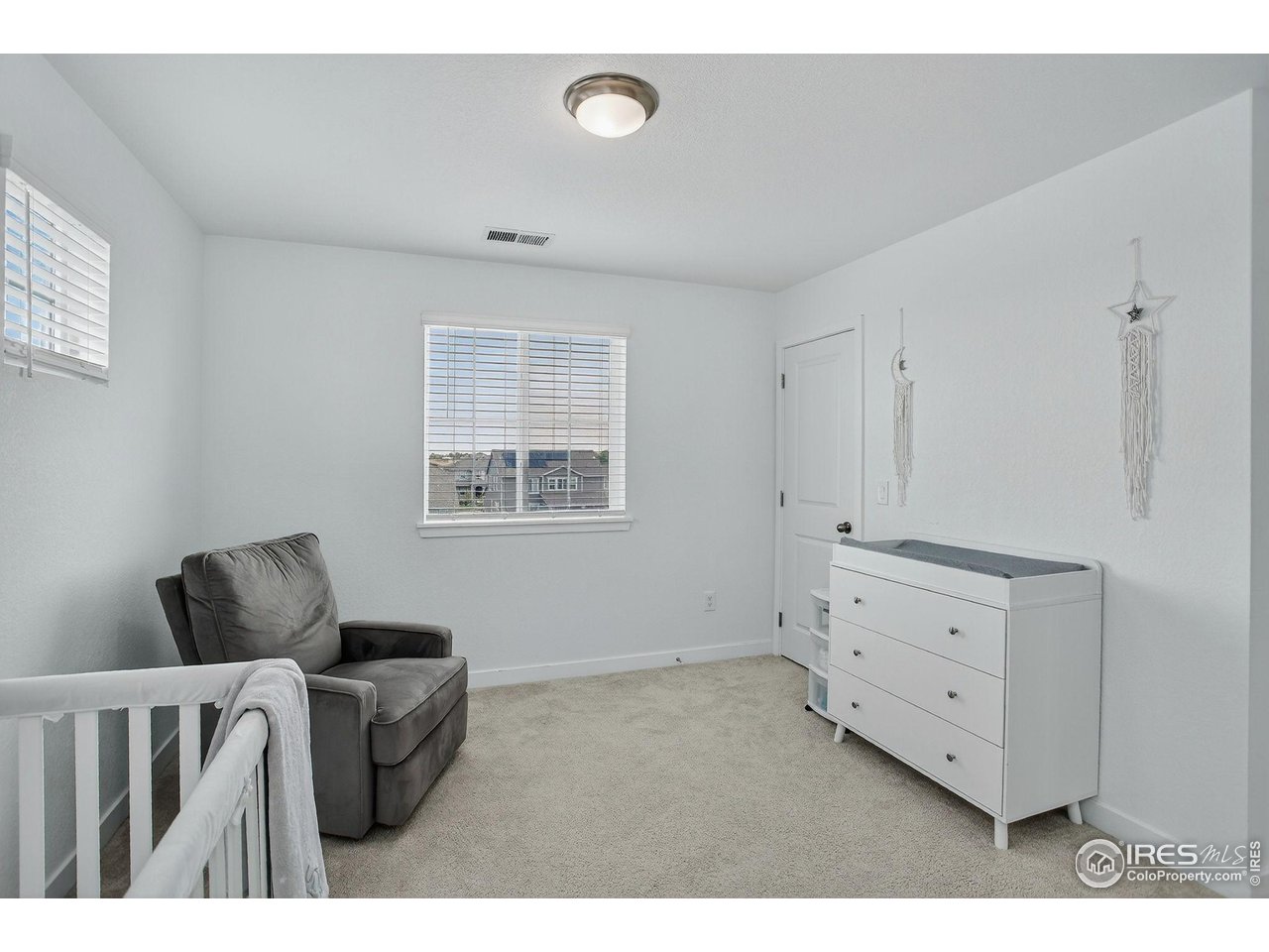 1920 Miranda Road Erie, CO 80516 - Photo 20 of 38 Secondary bedroom with access to walk in closet and Jack-and-Jill bathroom.