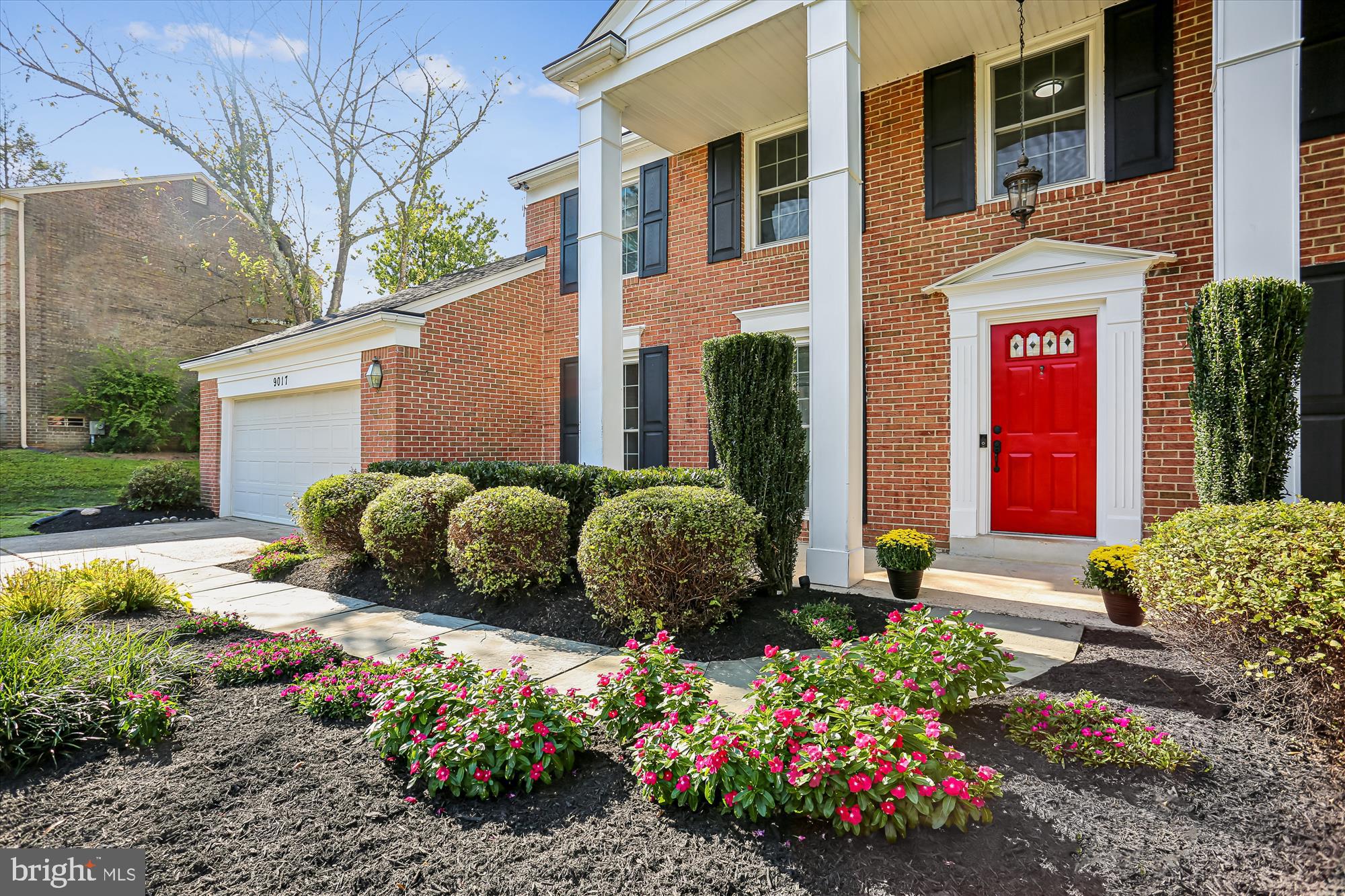 9017 Falls Chapel Way Potomac, MD 20854 - Photo 11 of 70 a view of a house with a yard and garden