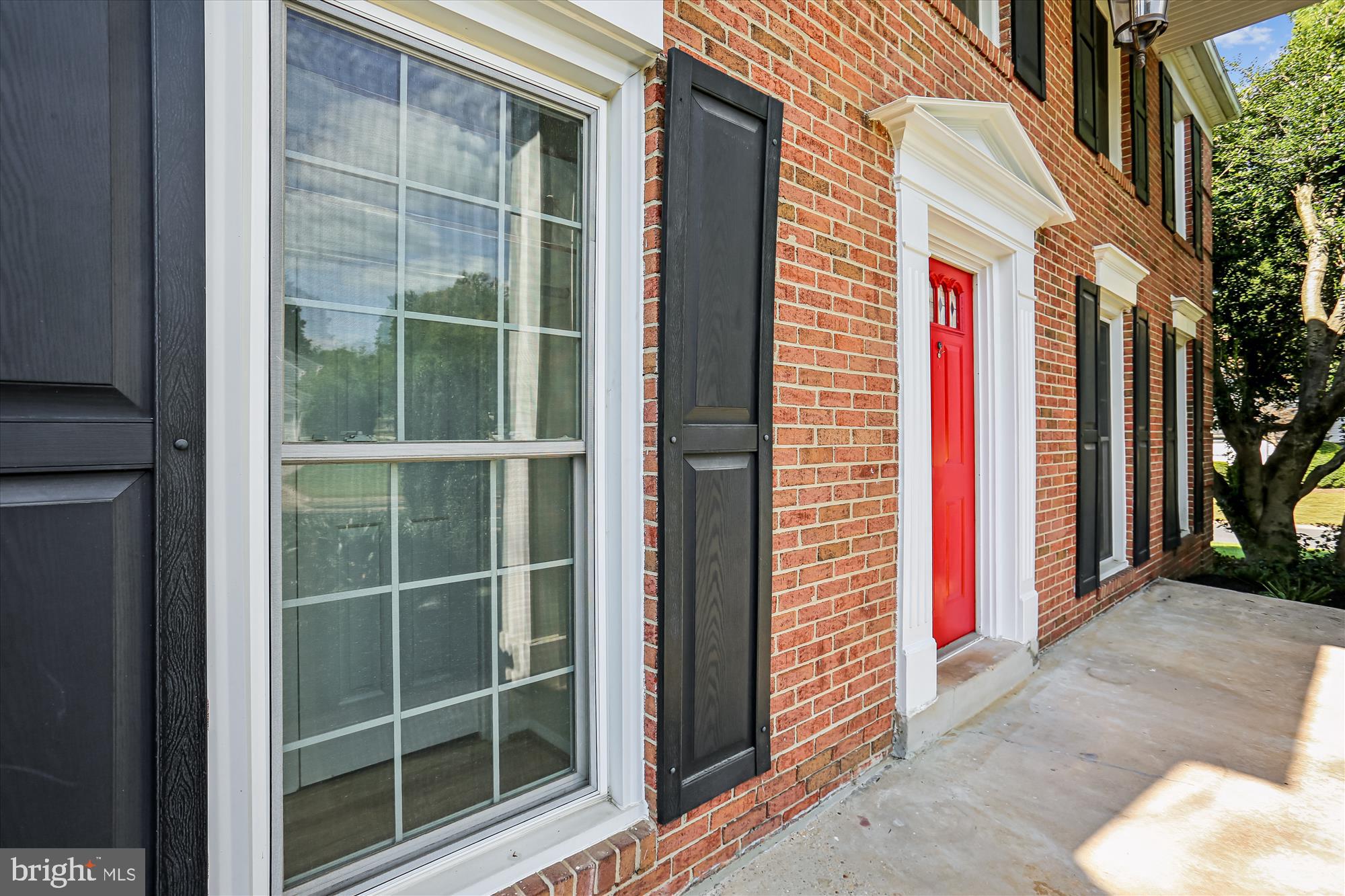9017 Falls Chapel Way Potomac, MD 20854 - Photo 12 of 70 a view of a door and a window of the house