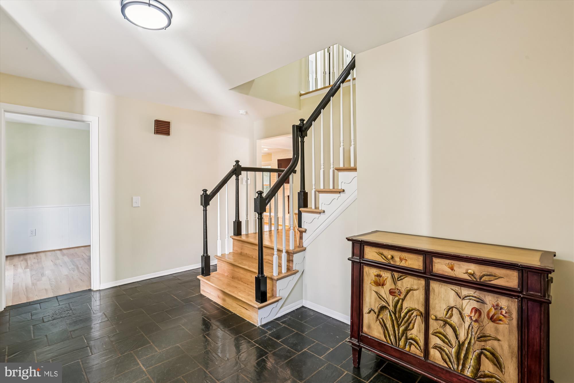 9017 Falls Chapel Way Potomac, MD 20854 - Photo 2 of 70 a view of entryway with wooden floor and stairs