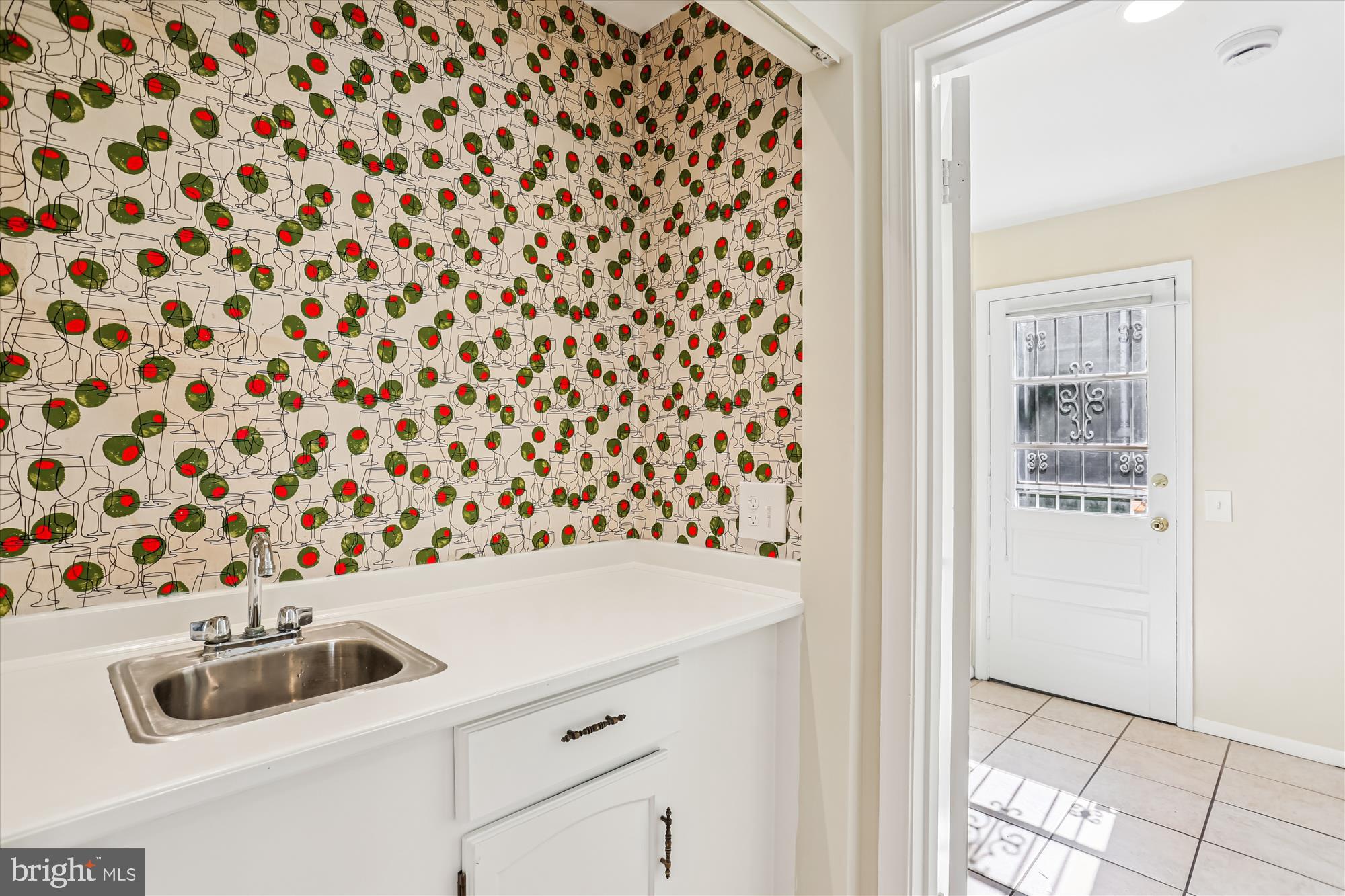 9017 Falls Chapel Way Potomac, MD 20854 - Photo 30 of 70 a bathroom with a sink and a mirror