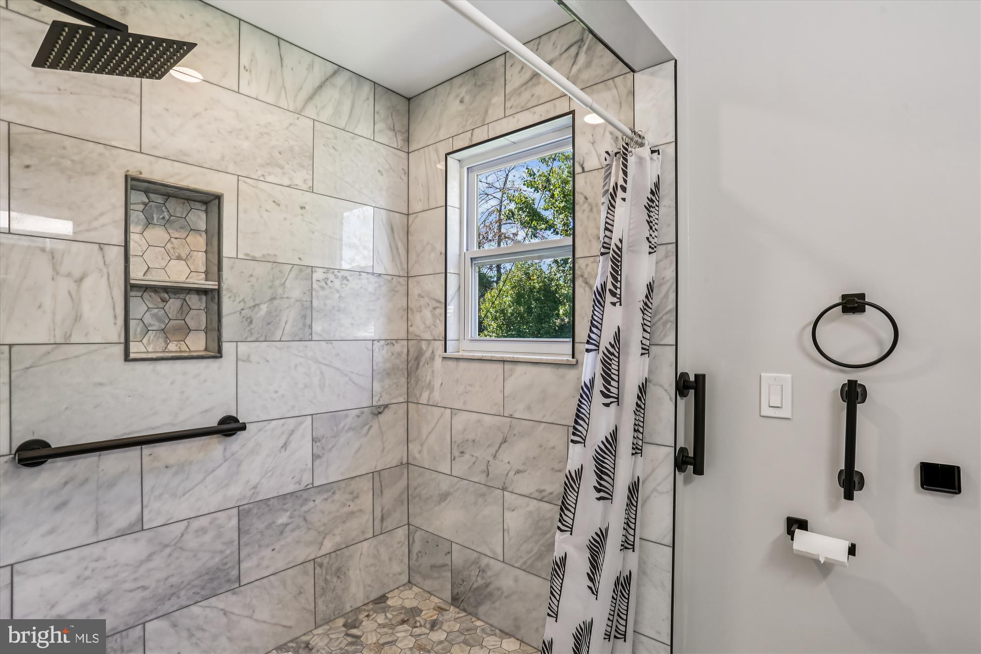 9017 Falls Chapel Way Potomac, MD 20854 - Photo 33 of 70 a bathroom with a shower