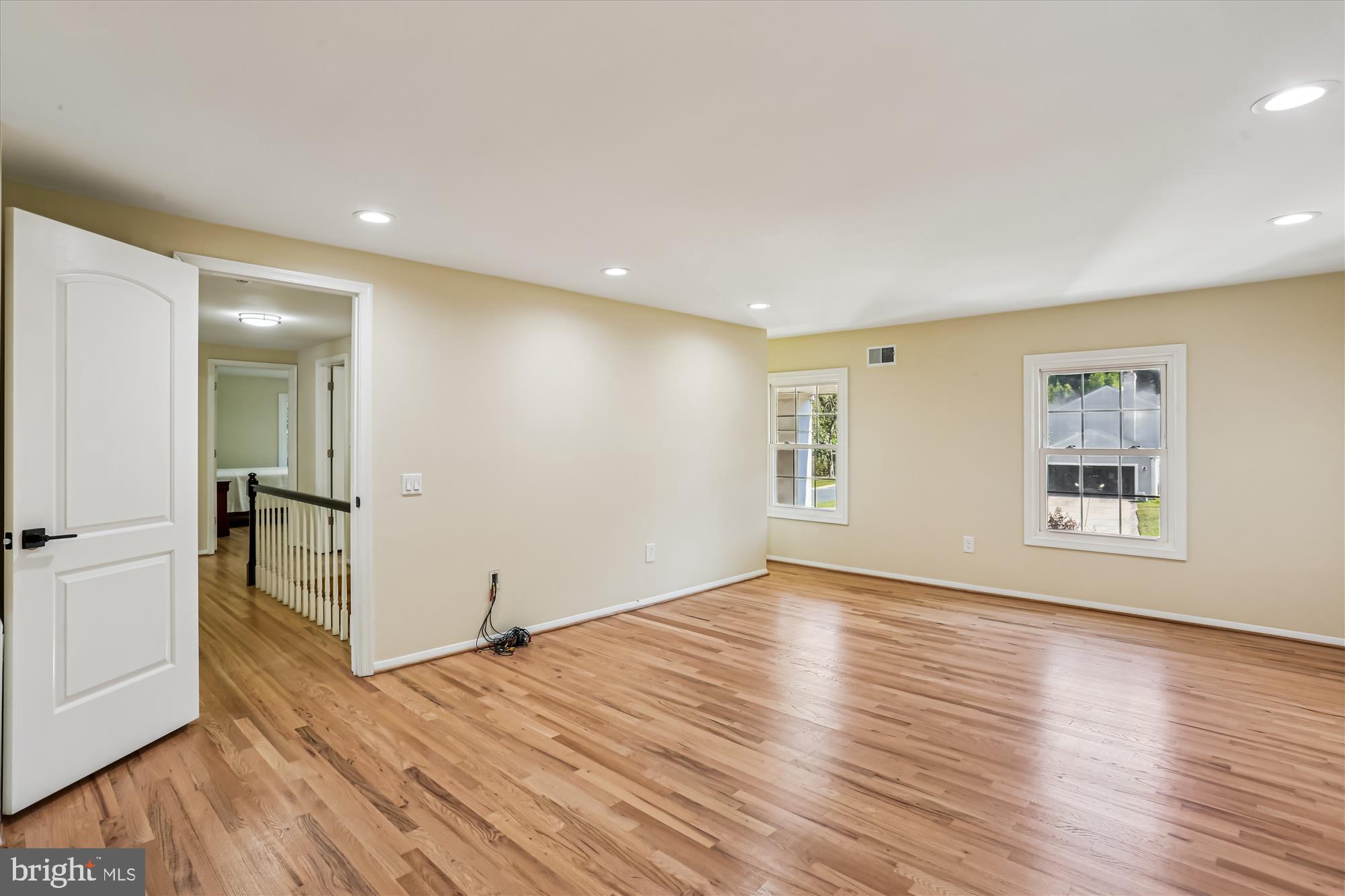 9017 Falls Chapel Way Potomac, MD 20854 - Photo 38 of 70 a view of empty room with wooden floor