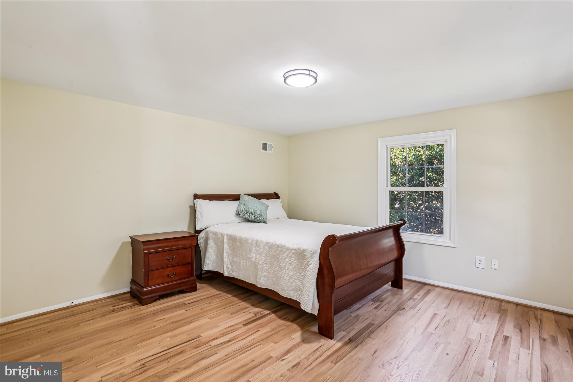 9017 Falls Chapel Way Potomac, MD 20854 - Photo 44 of 70 a room with a bed and a window