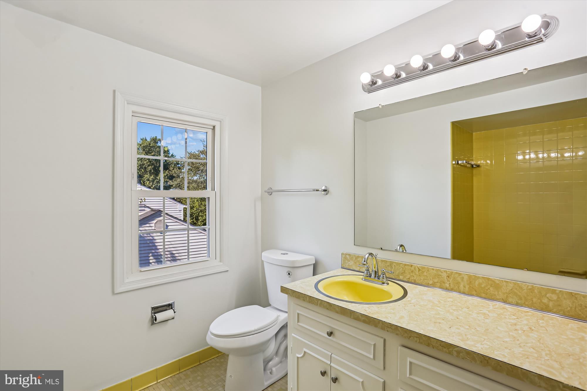 9017 Falls Chapel Way Potomac, MD 20854 - Photo 47 of 70 a bathroom with a granite countertop sink mirror vanity and a toilet