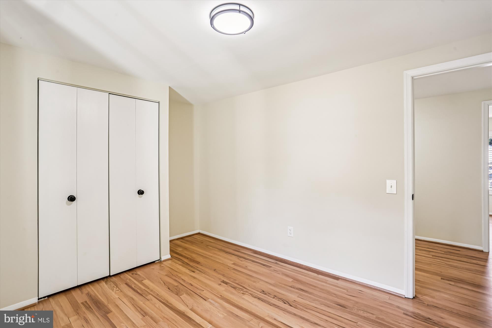 9017 Falls Chapel Way Potomac, MD 20854 - Photo 52 of 70 a view of a room with wooden floor
