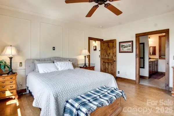 a bedroom with a bed and a walk in closet