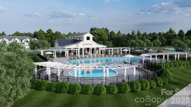 a view of a house with a yard in front of house