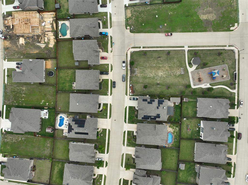 1084 Imperial Eagle Road Alvarado, TX 76009 - Photo 37 of 39 an aerial view of residential houses with outdoor space and parking