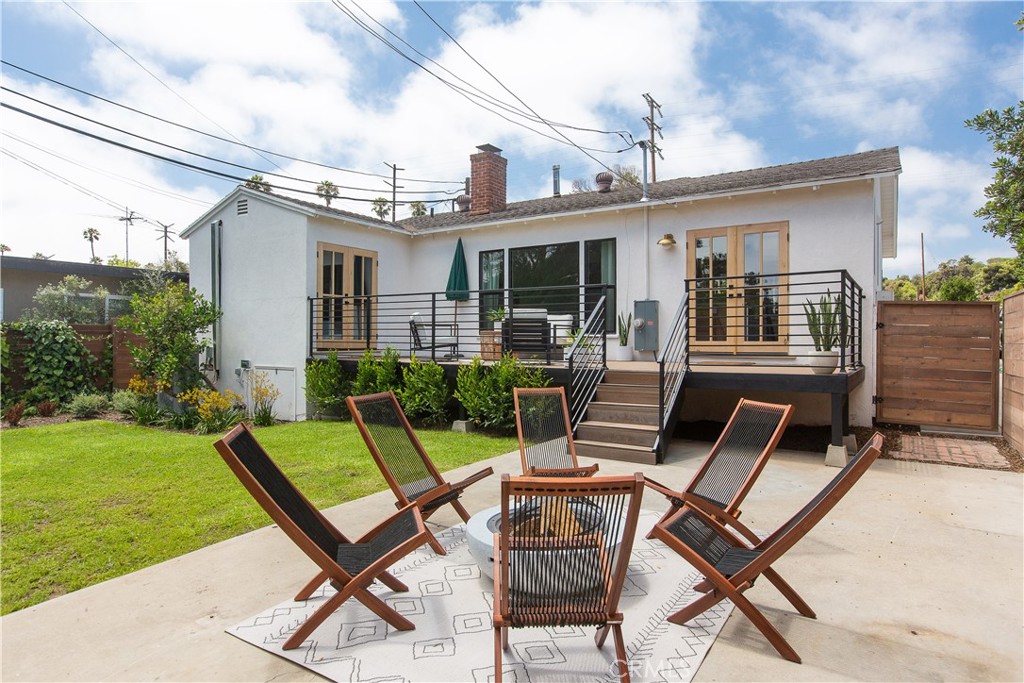 2372 Dewey Street Santa Monica, CA 90405 - Photo 21 of 22 a view of a house with backyard sitting area and garden