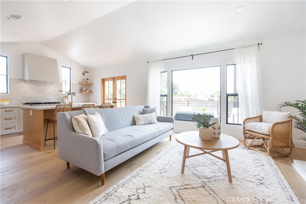 2372 Dewey Street Santa Monica, CA 90405 - Photo 4 of 22 a living room with furniture and a large window
