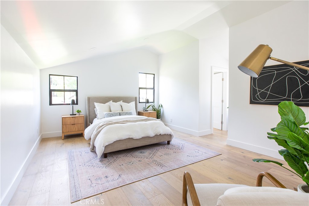 2372 Dewey Street Santa Monica, CA 90405 - Photo 9 of 22 a bedroom with a bed and window
