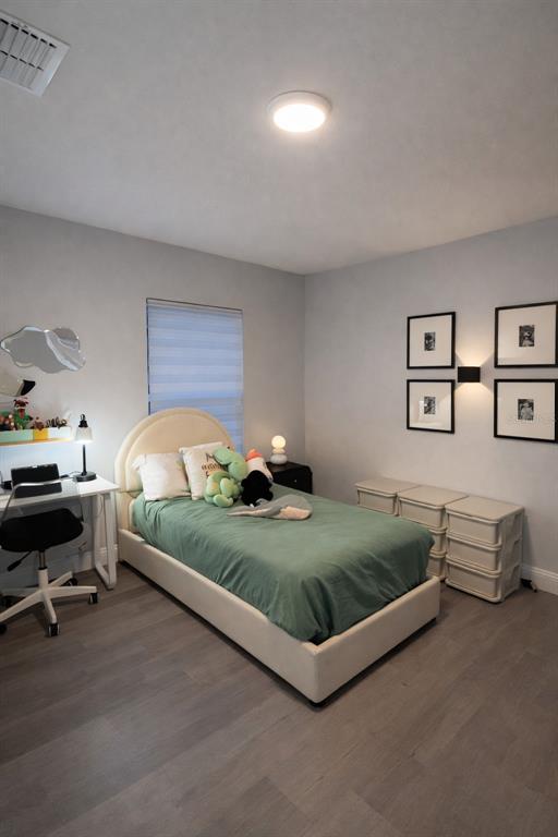 39 Redwood Track Run Ocala, FL 34472 - Photo 4 of 5 a spacious bedroom with a bed and window