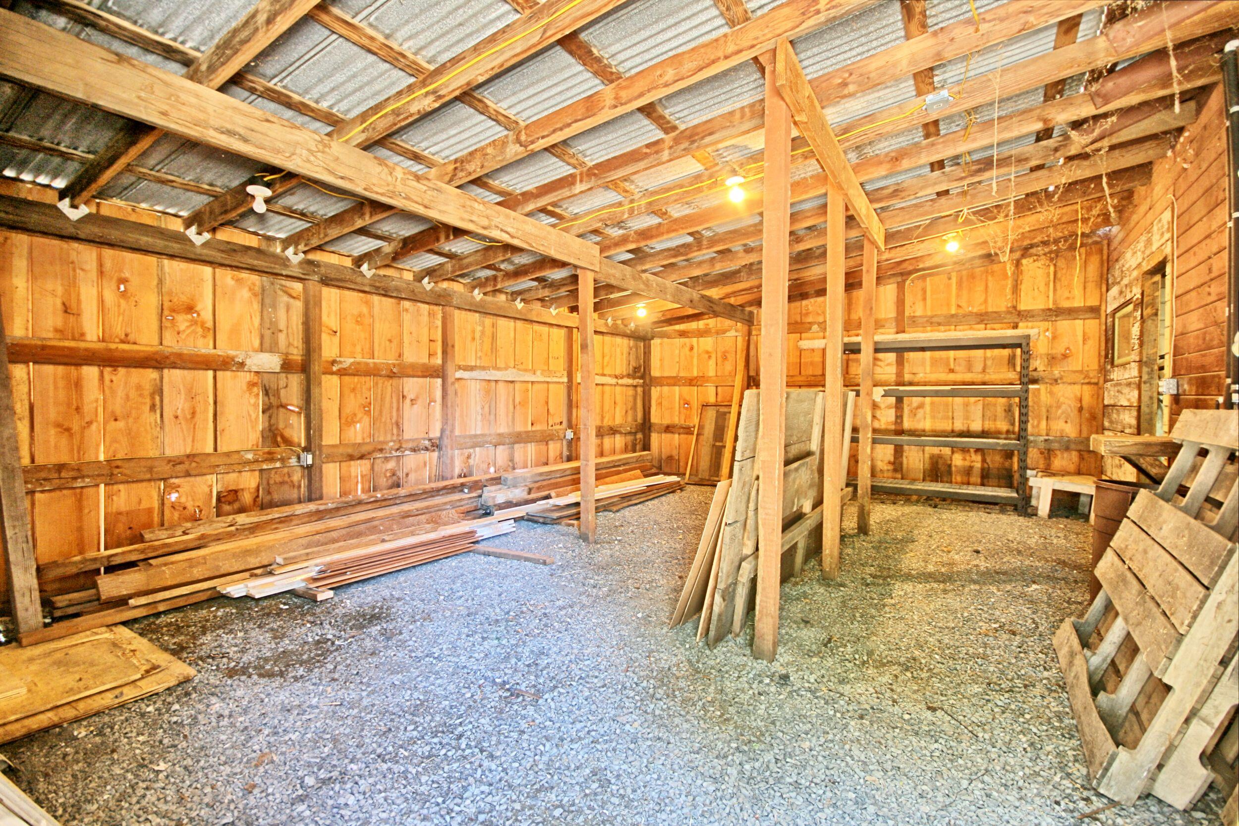 199 Powell Creek Road Williams, OR 97544 - Photo 47 of 57 a view of a room with wooden floor