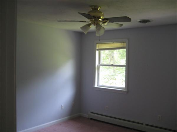 71 Spectacle Hill Road Bolton, MA 01740 - Photo 12 of 20 a view of an empty room with a window