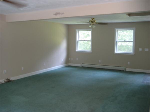 71 Spectacle Hill Road Bolton, MA 01740 - Photo 7 of 20 an empty room with a window