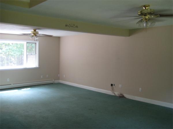 71 Spectacle Hill Road Bolton, MA 01740 - Photo 8 of 20 an empty room with a window