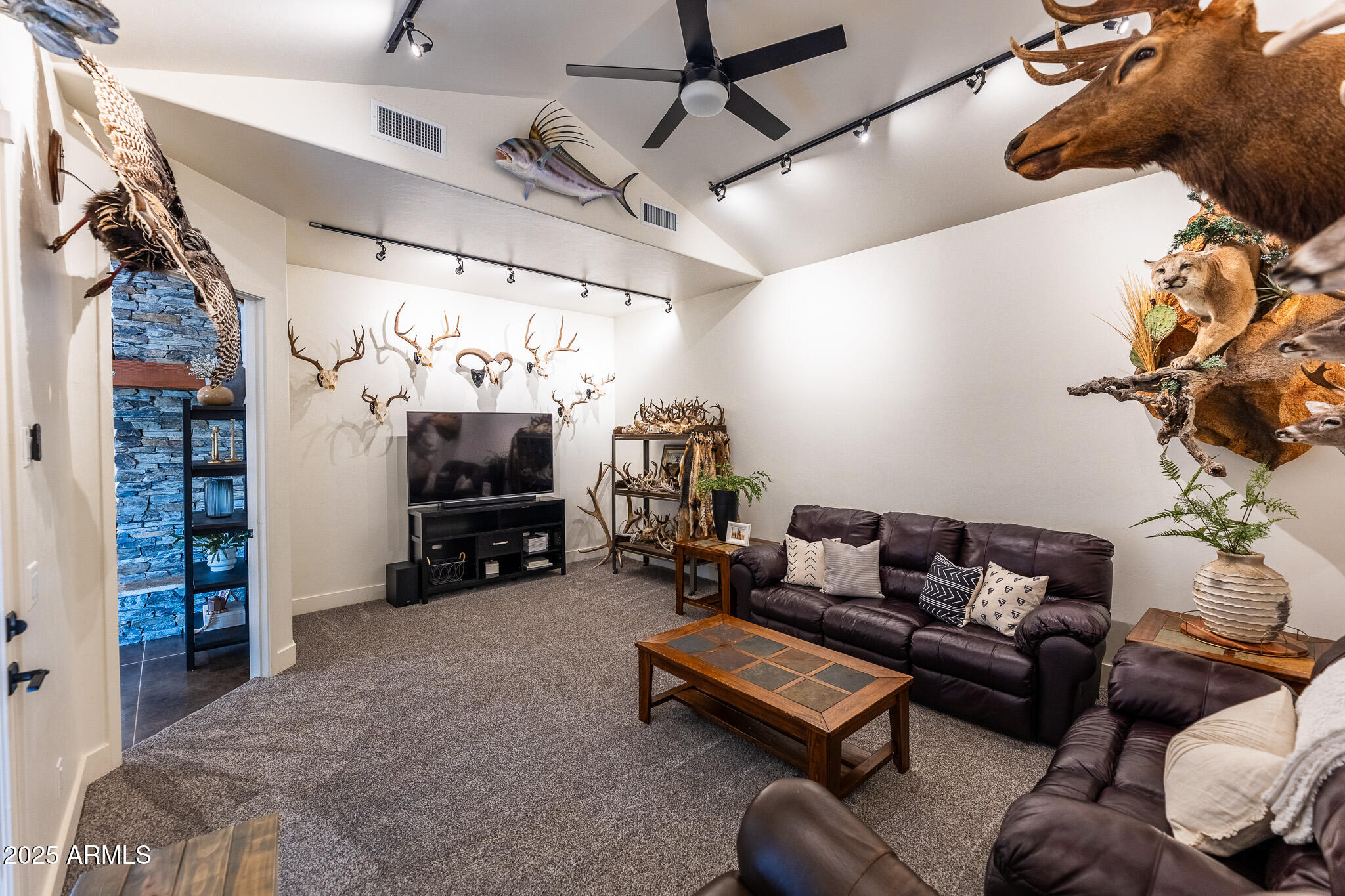 1778 East Ramsey Road Benson, AZ 85602 - Photo 13 of 50 a living room with furniture and a couch