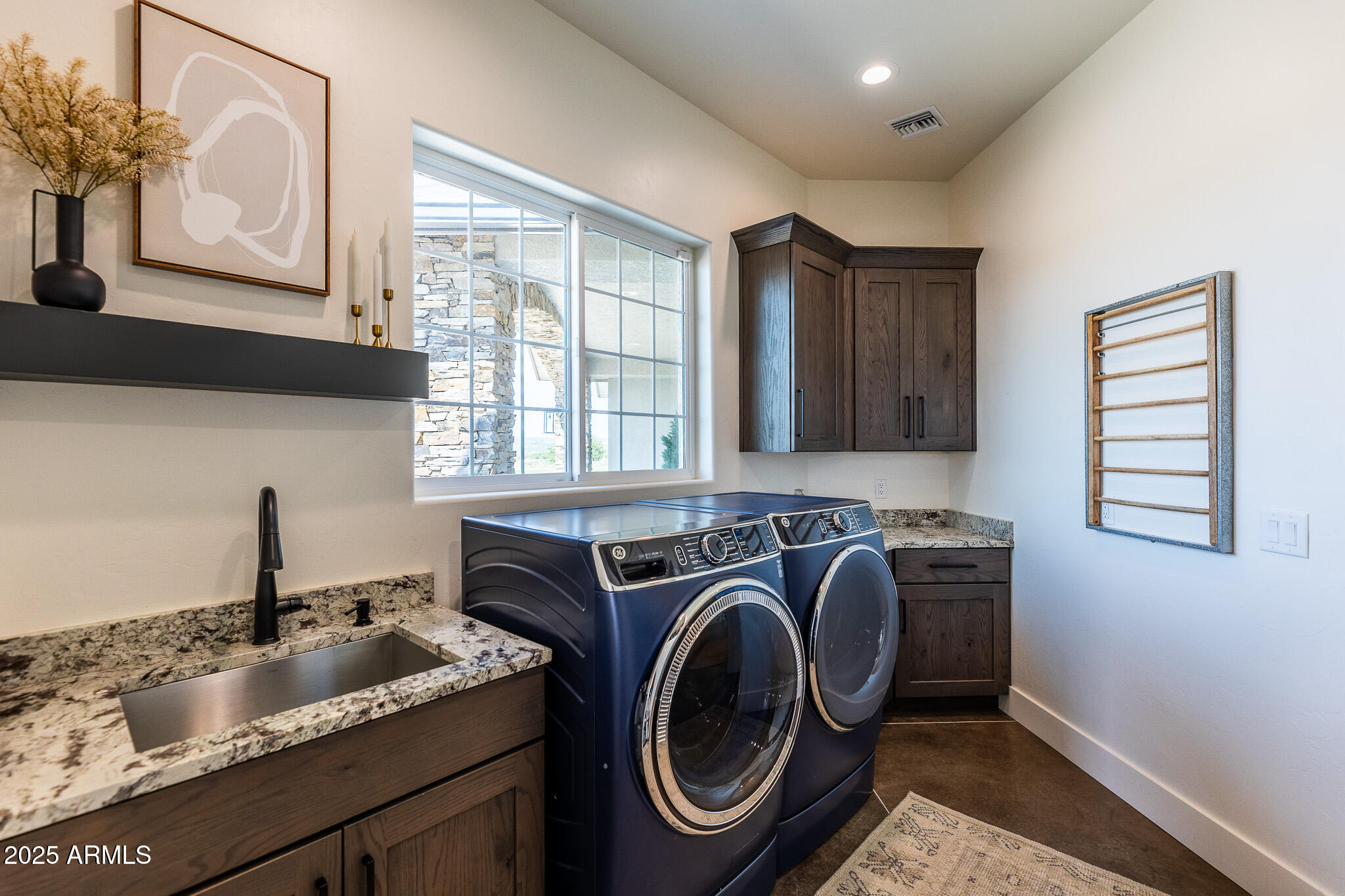 1778 East Ramsey Road Benson, AZ 85602 - Photo 20 of 50 a utility room with sink dryer and washer