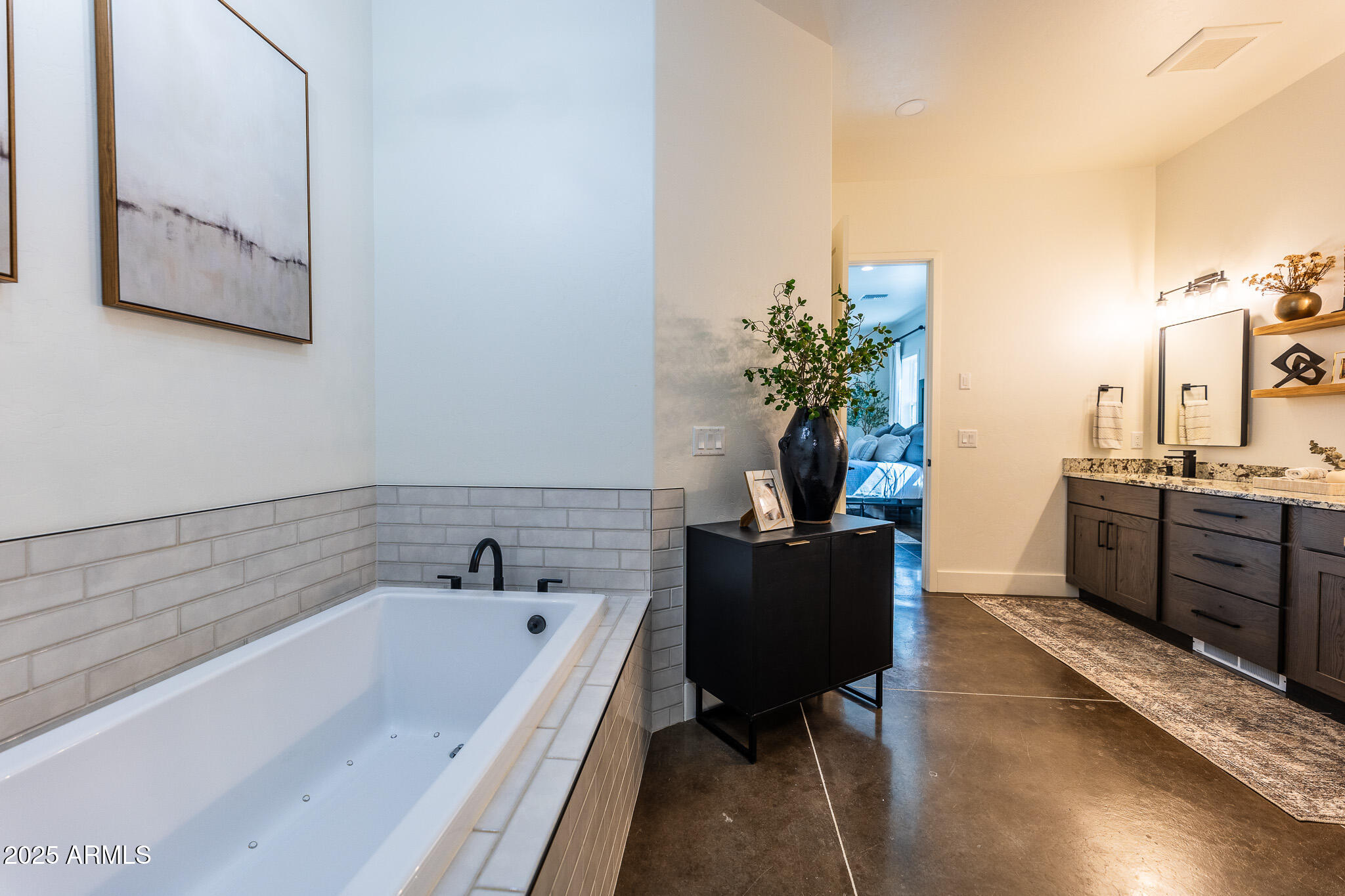 1778 East Ramsey Road Benson, AZ 85602 - Photo 28 of 50 a bathroom with a tub sink and mirror