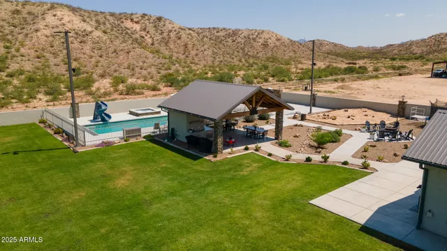 a terrace of a house with outdoor seating
