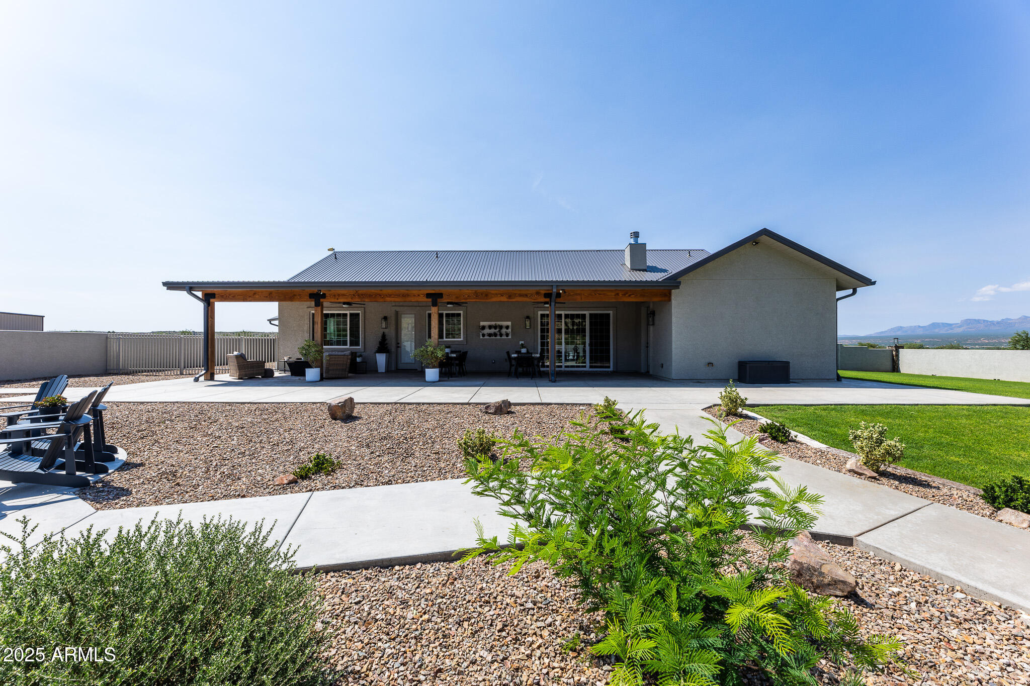 1778 East Ramsey Road Benson, AZ 85602 - Photo 44 of 50 a front view of a house with a yard