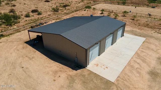 a view of a backyard of a house
