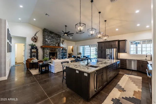 a view of a kitchen and dining room