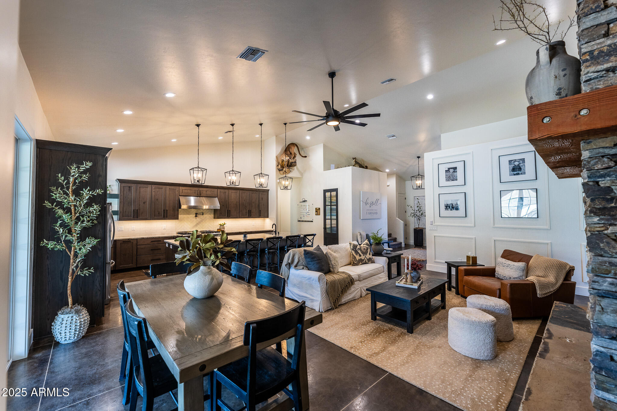 1778 East Ramsey Road Benson, AZ 85602 - Photo 8 of 50 a living room with furniture a rug and a fireplace
