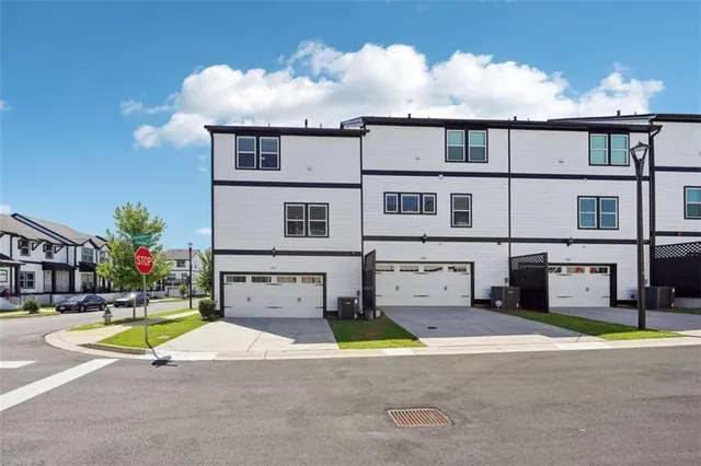 a view of swimming pool with a yard in front of it