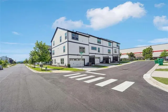 a view of a building with a street