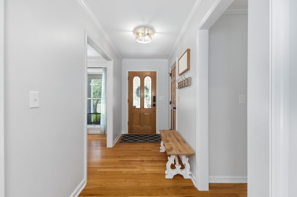 3597 McMahan Road Morrison, TN 37357 - Photo 11 of 45 a view of a hallway with wooden floor and a livingroom