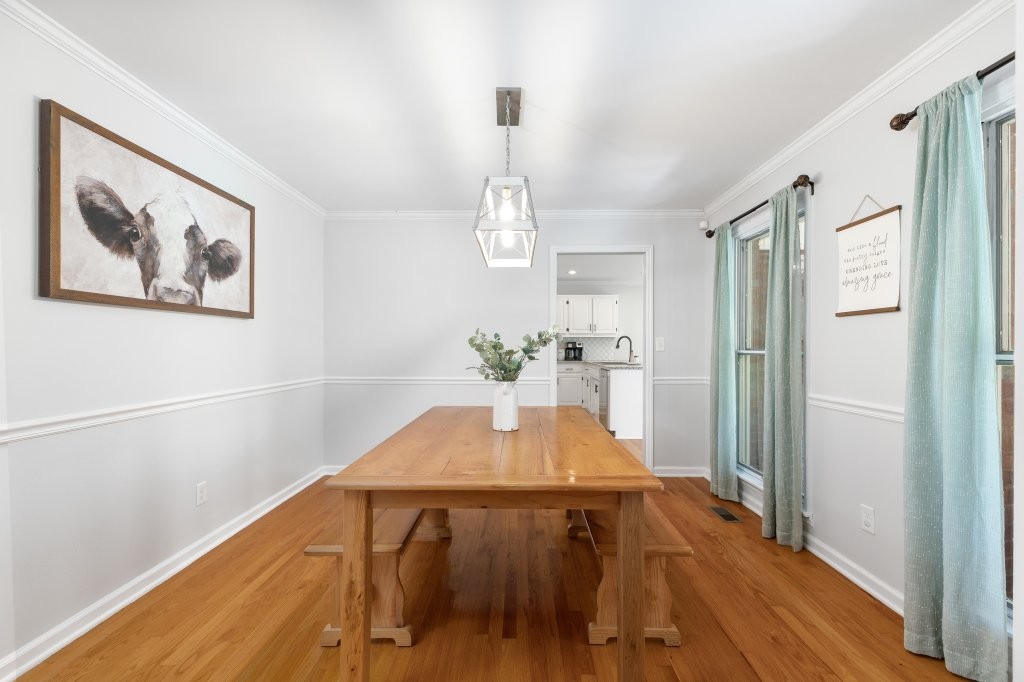 3597 McMahan Road Morrison, TN 37357 - Photo 18 of 45 a view of a dining room with furniture window and wooden floor