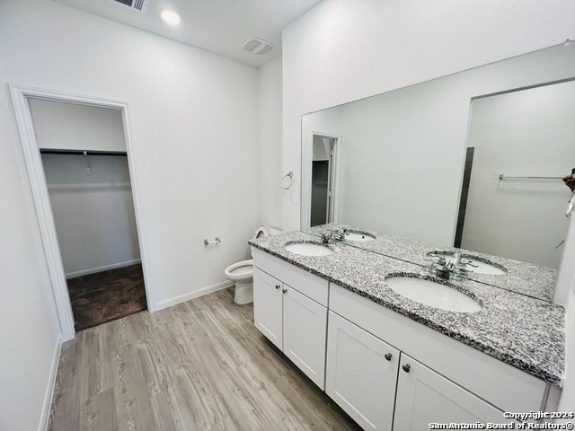 32141 Morels Avenue Bulverde, TX 78163 - Photo 10 of 22 a bathroom with a sink and a mirror