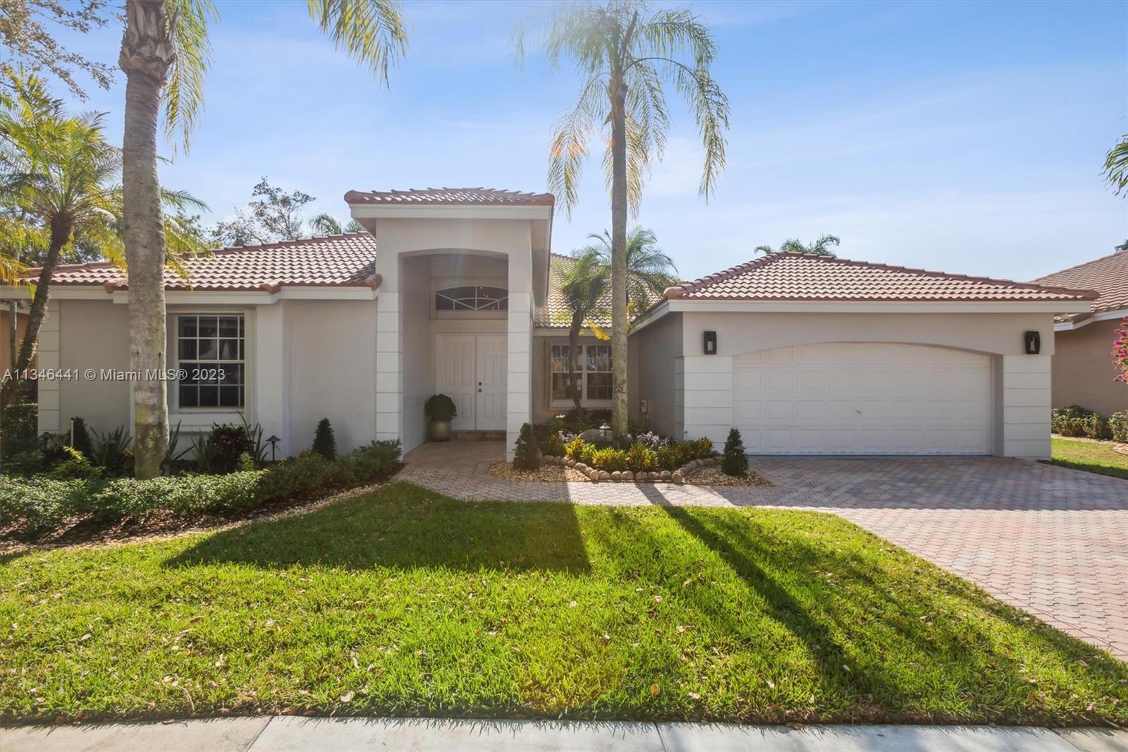 front view of house with a yard