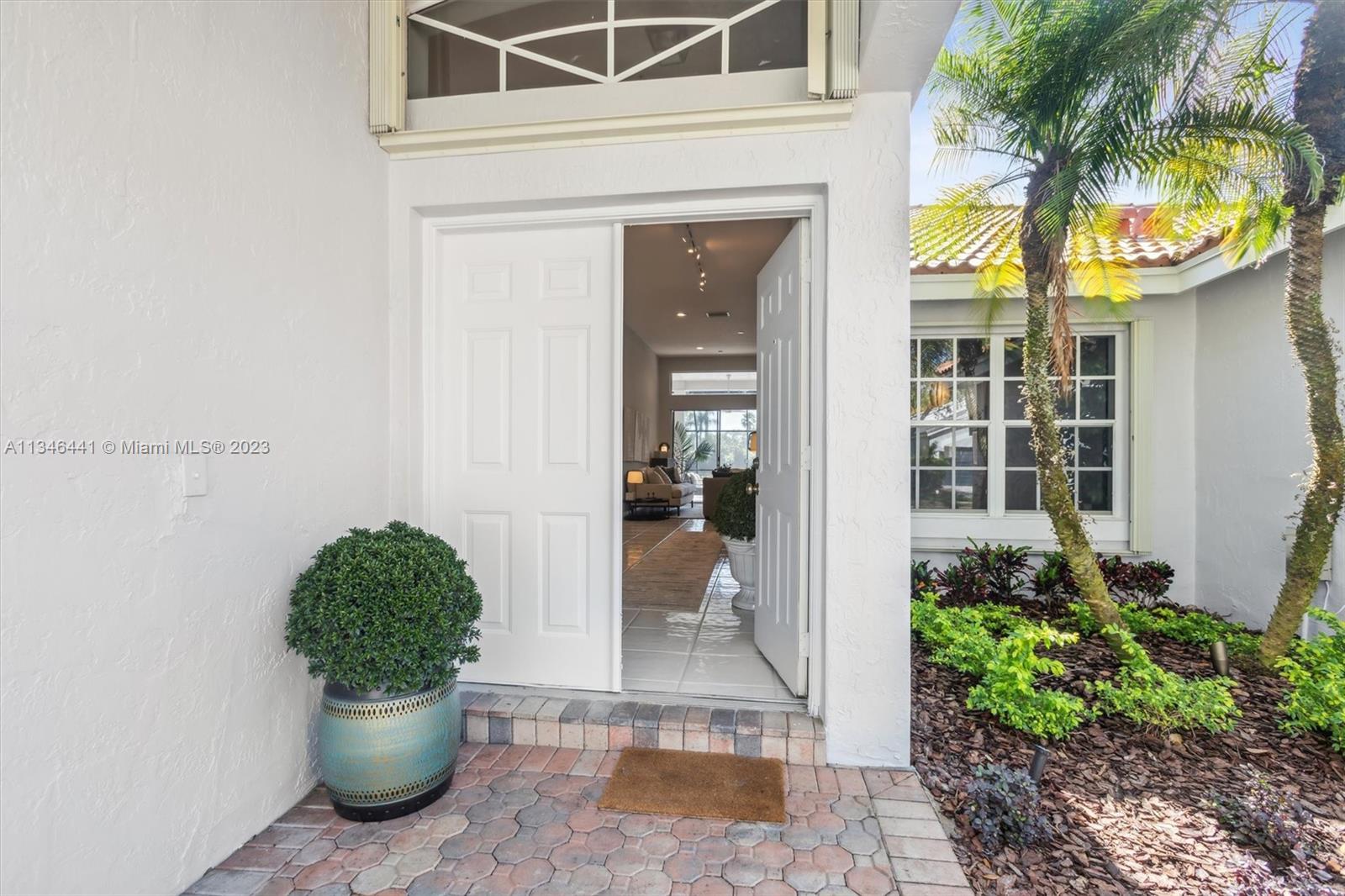 2883 Oakbrook Drive Weston, FL 33332 - Photo 3 of 74 a view of a entryway door of the house